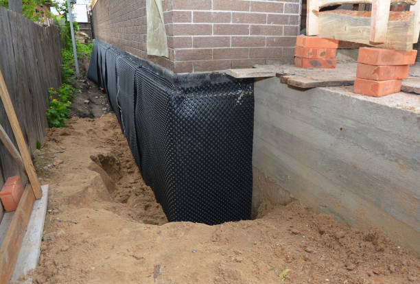 Happy homeowners after waterproofing job in Nokesville